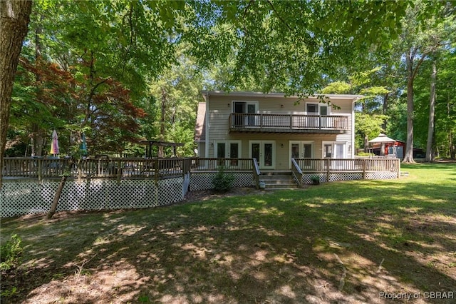 844 Rocky Point Lndg, Cobbs Creek, VA 23035 - rear view of property featuring french doors, a deck, a balcony, and a yard