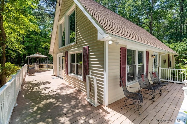 844 Rocky Point Lndg, Cobbs Creek, VA 23035 - wooden deck with view of scattered trees