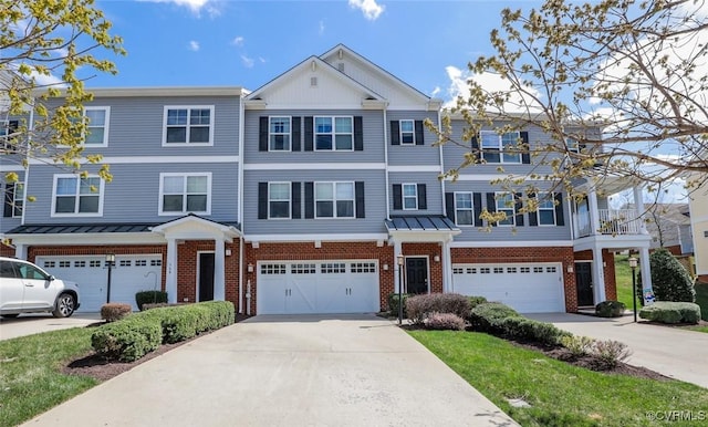 566 Abbey Village Cir, Midlothian, VA 23114 - multi unit property featuring brick siding, a garage, concrete driveway, and a standing seam roof