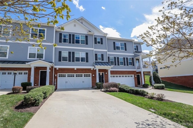 566 Abbey Village Cir, Midlothian, VA 23114 - multi unit property with brick siding, an attached garage, concrete driveway, and a standing seam roof