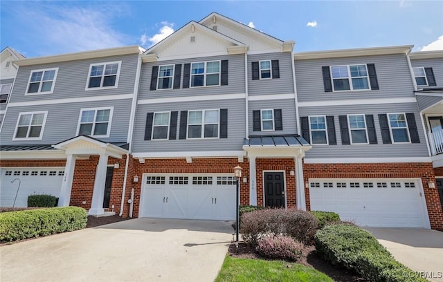566 Abbey Village Cir, Midlothian, VA 23114 - multi unit property with brick siding, an attached garage, and driveway