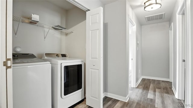 566 Abbey Village Cir, Midlothian, VA 23114 - laundry room with washer and clothes dryer and wood finished floors