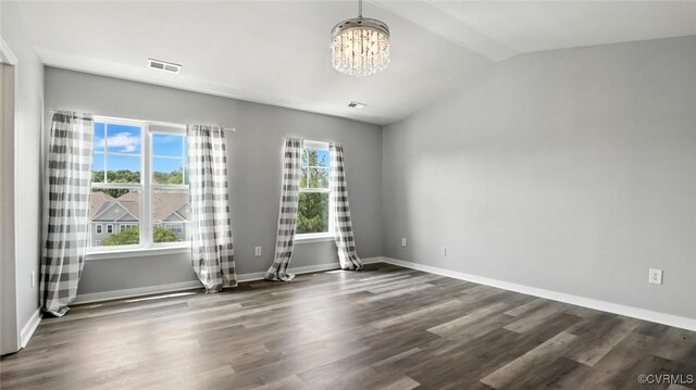 566 Abbey Village Cir, Midlothian, VA 23114 - empty room with a chandelier, lofted ceiling, and wood finished floors