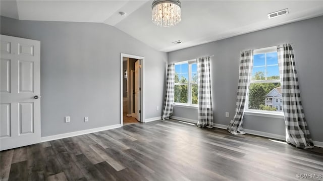 566 Abbey Village Cir, Midlothian, VA 23114 - unfurnished bedroom with vaulted ceiling, a chandelier, wood finished floors, and ensuite bath