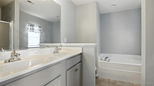 566 Abbey Village Cir, Midlothian, VA 23114 - bathroom featuring double vanity, a garden tub, and a shower stall