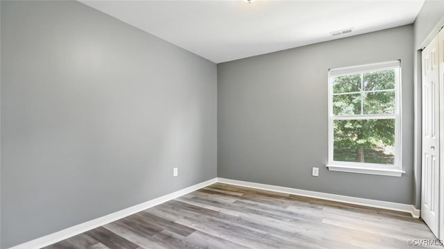 566 Abbey Village Cir, Midlothian, VA 23114 - empty room featuring wood finished floors and baseboards