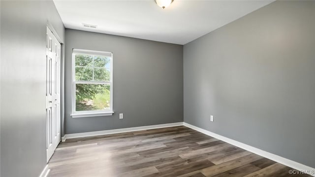 566 Abbey Village Cir, Midlothian, VA 23114 - unfurnished room with baseboards and wood finished floors