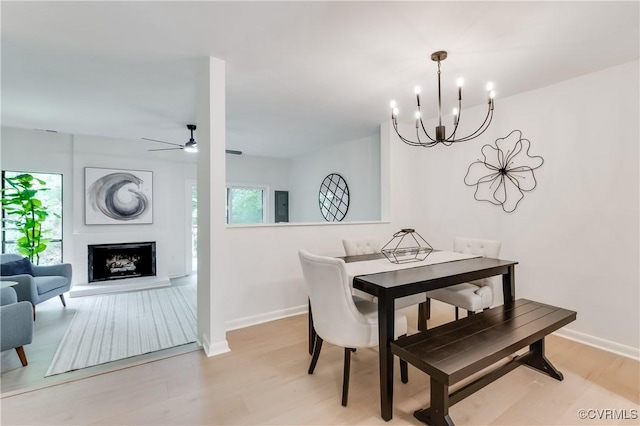 11904 W Briar Patch Dr, Midlothian, VA 23113 - dining area featuring a chandelier, a ceiling fan, electric panel, and light wood-type flooring