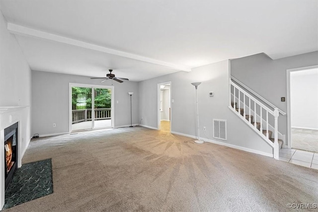 12628 Copperas Ln, Richmond, VA 23233 - unfurnished living room featuring carpet, a ceiling fan, stairs, a fireplace with flush hearth, and beamed ceiling