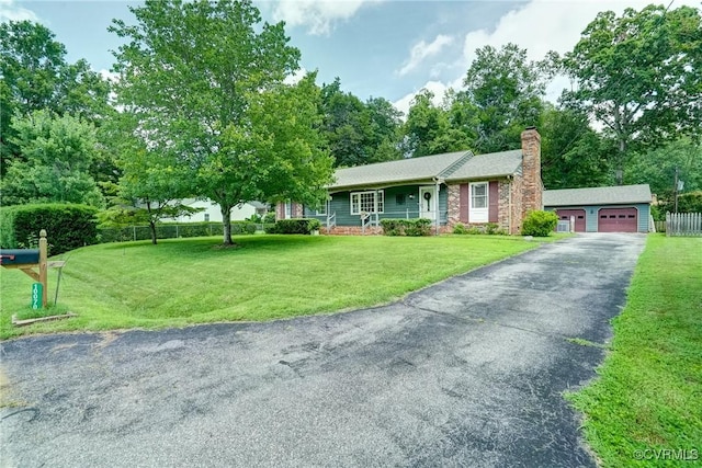 10070 Rinker Dr, Mechanicsville, VA 23116 - ranch-style house with a chimney and a front yard