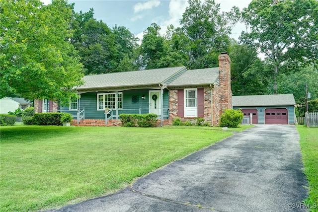 10070 Rinker Dr, Mechanicsville, VA 23116 - single story home with a porch, an outdoor structure, a chimney, and a front lawn