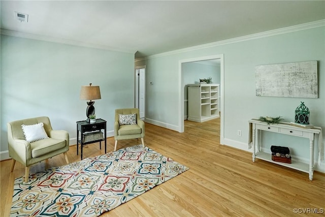 10070 Rinker Dr, Mechanicsville, VA 23116 - sitting room featuring ornamental molding and wood finished floors