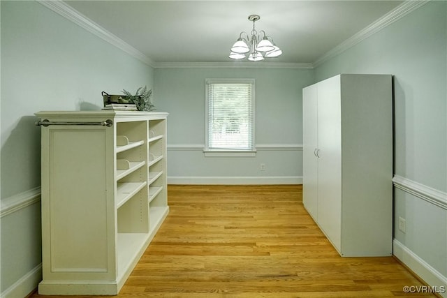 10070 Rinker Dr, Mechanicsville, VA 23116 - spacious closet featuring a chandelier and light wood finished floors