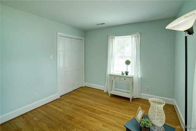 10070 Rinker Dr, Mechanicsville, VA 23116 - unfurnished room with baseboards and light wood-style flooring