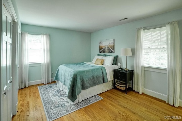 10070 Rinker Dr, Mechanicsville, VA 23116 - bedroom with light wood finished floors and baseboards