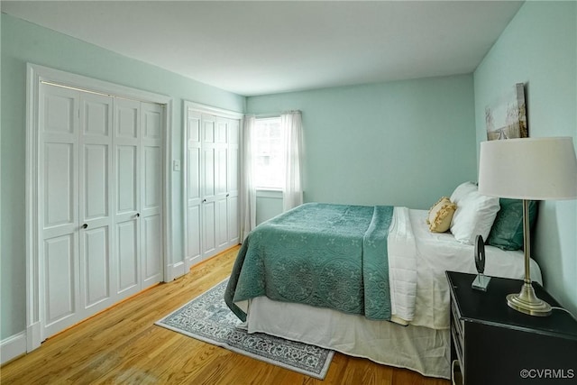 10070 Rinker Dr, Mechanicsville, VA 23116 - bedroom with wood finished floors and multiple closets