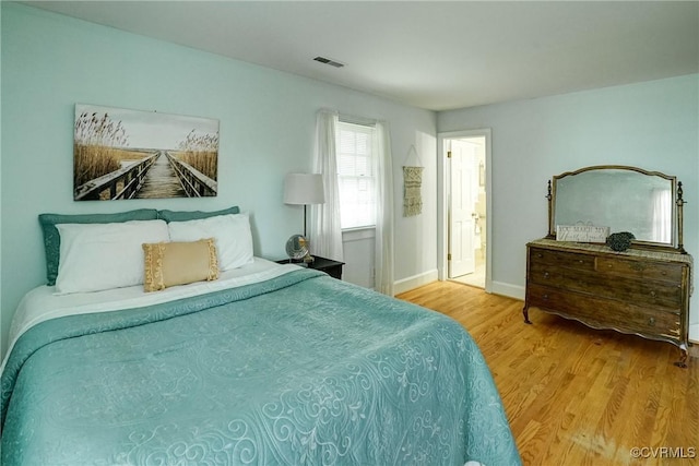 10070 Rinker Dr, Mechanicsville, VA 23116 - bedroom featuring wood finished floors and baseboards