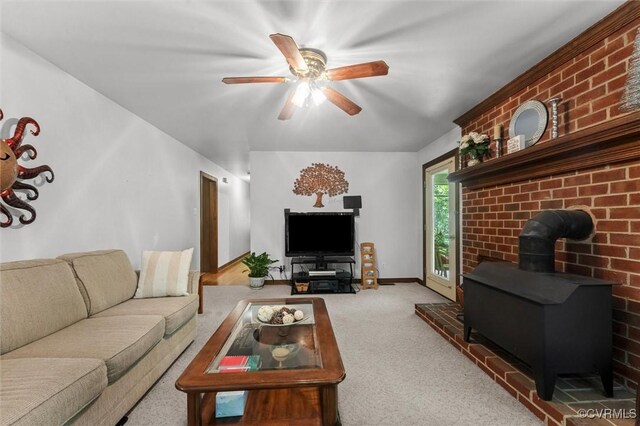 124 Gammons Vw, Bumpass, VA 23024 - carpeted living area featuring a wood stove and a ceiling fan