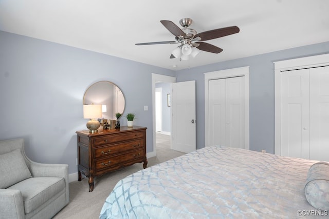 2432 Gammons Creek Dr, Maidens, VA 23102 - bedroom featuring two closets, light colored carpet, and a ceiling fan