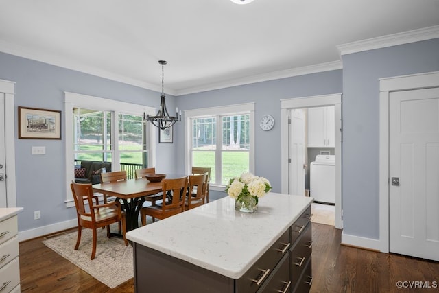 2432 Gammons Creek Dr, Maidens, VA 23102 - kitchen with washer / clothes dryer, a chandelier, dark wood-type flooring, plenty of natural light, and ornamental molding