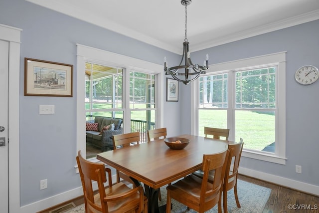 2432 Gammons Creek Dr, Maidens, VA 23102 - dining space featuring a chandelier, crown molding, and wood finished floors