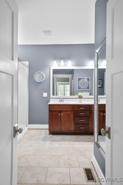 2432 Gammons Creek Dr, Maidens, VA 23102 - bathroom with vanity and baseboards