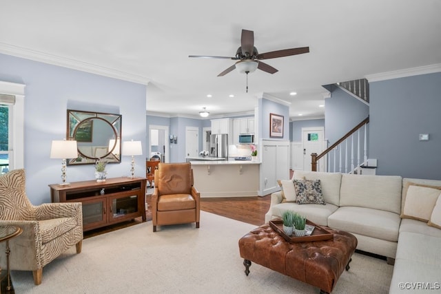 2432 Gammons Creek Dr, Maidens, VA 23102 - living room featuring ceiling fan, ornamental molding, stairs, light wood-type flooring, and recessed lighting