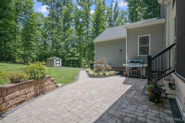 2432 Gammons Creek Dr, Maidens, VA 23102 - view of patio / terrace with a storage shed and grilling area