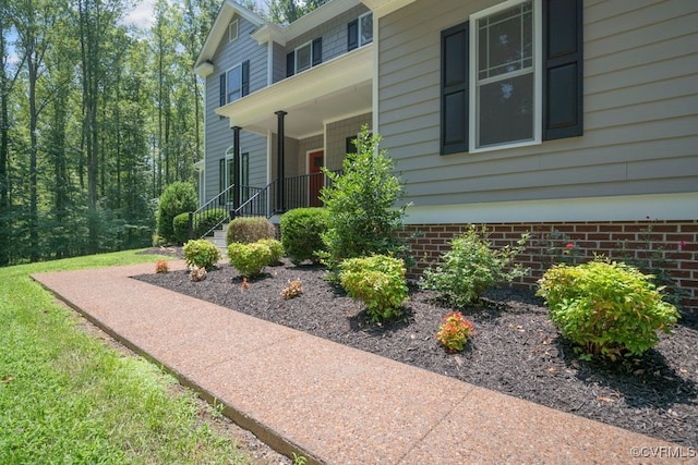 2432 Gammons Creek Dr, Maidens, VA 23102 - view of exterior entry featuring covered porch