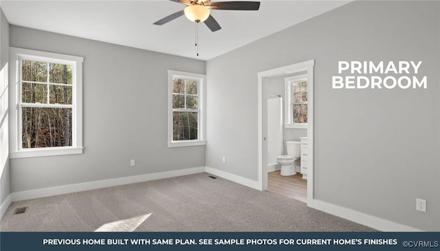 447 Raleigh Ave, South Hill, VA 23970 - unfurnished bedroom featuring carpet floors and connected bathroom