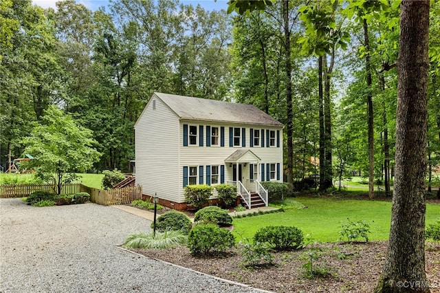 2708 Pineridge Ln, Powhatan, VA 23139 - colonial home featuring driveway and view of scattered trees