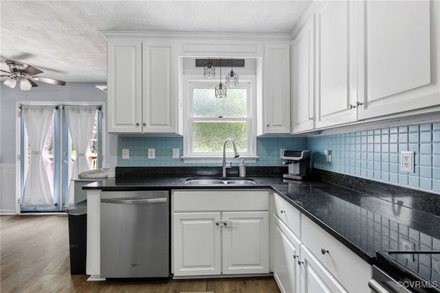 2708 Pineridge Ln, Powhatan, VA 23139 - kitchen featuring stainless steel dishwasher, ceiling fan, white cabinetry, backsplash, and a textured ceiling