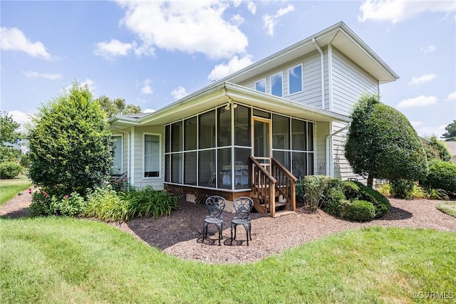 10966 Bland Ridge Dr, South Prince George, VA 23805 - view of front of property featuring a sunroom and a front lawn