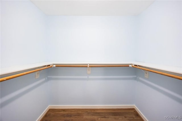 10966 Bland Ridge Dr, South Prince George, VA 23805 - walk in closet featuring wood finished floors