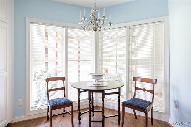 10966 Bland Ridge Dr, South Prince George, VA 23805 - dining space with a chandelier, healthy amount of natural light, and wood finished floors