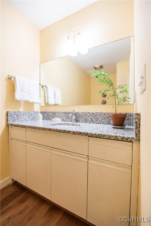 10966 Bland Ridge Dr, South Prince George, VA 23805 - bathroom featuring vanity and wood finished floors