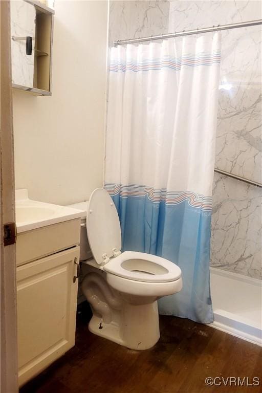 422 Walnut St, Petersburg, VA 23803 - full bathroom with vanity, wood finished floors, and curtained shower
