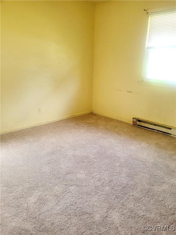 422 Walnut St, Petersburg, VA 23803 - carpeted empty room featuring a baseboard radiator and baseboards