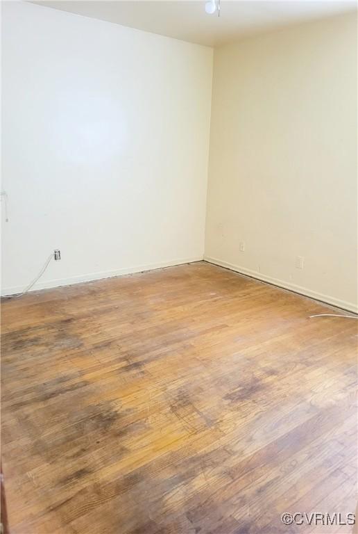 422 Walnut St, Petersburg, VA 23803 - empty room featuring light wood finished floors