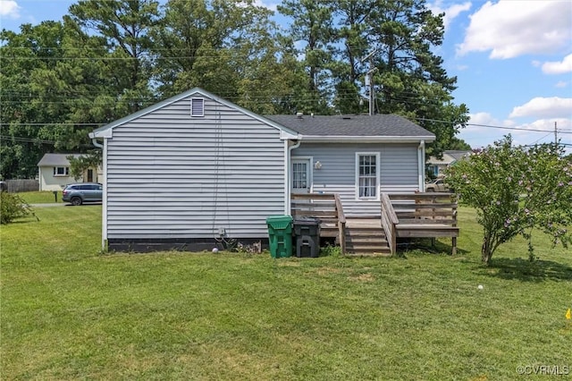 713 Lakeview Ave, Colonial Heights, VA 23834 - back of property with a deck and a yard
