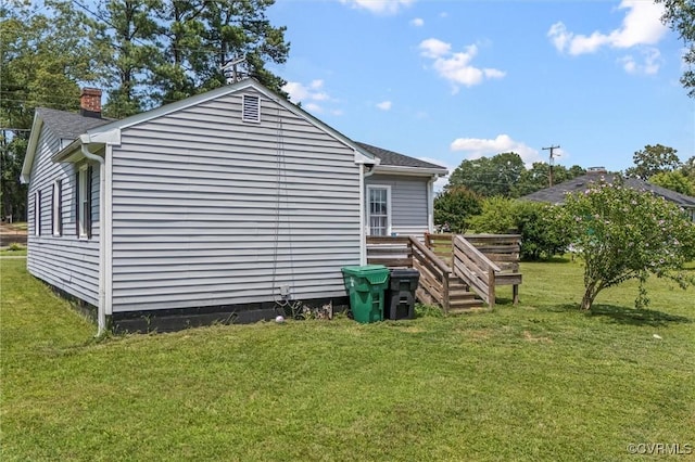 713 Lakeview Ave, Colonial Heights, VA 23834 - view of side of home featuring a chimney and a lawn