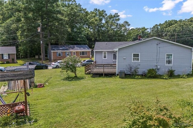 713 Lakeview Ave, Colonial Heights, VA 23834 - rear view of house featuring a wooden deck and a yard