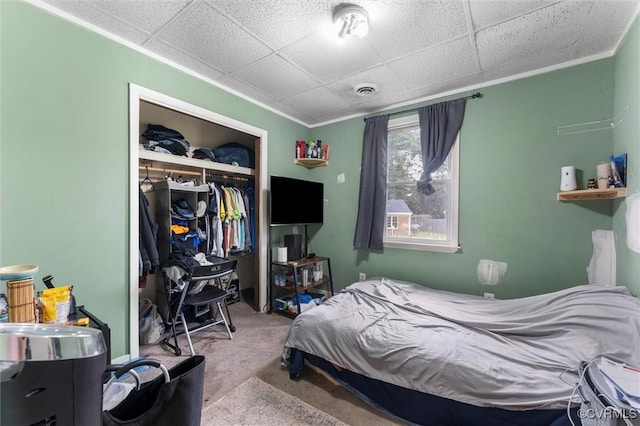 713 Lakeview Ave, Colonial Heights, VA 23834 - bedroom featuring carpet floors, a closet, a paneled ceiling, and ornamental molding