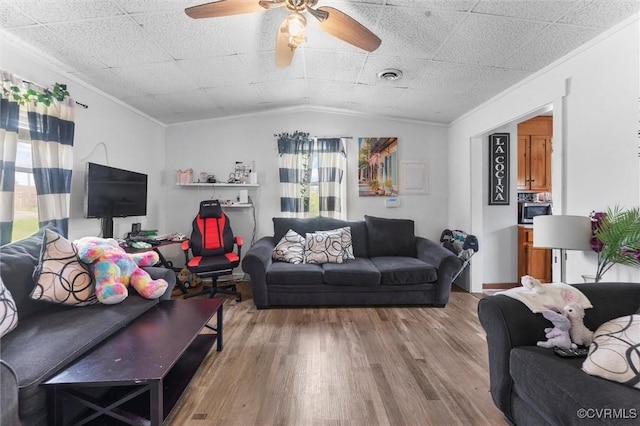 713 Lakeview Ave, Colonial Heights, VA 23834 - living room with wood finished floors, ornamental molding, a ceiling fan, and lofted ceiling