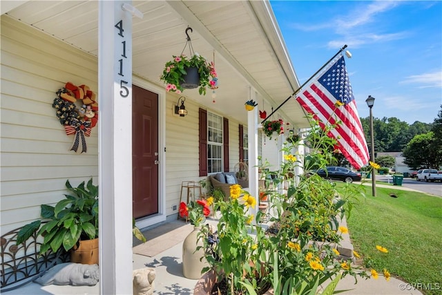 4115 Stonewood Ln, Williamsburg, VA 23188 - entrance to property featuring covered porch and a yard