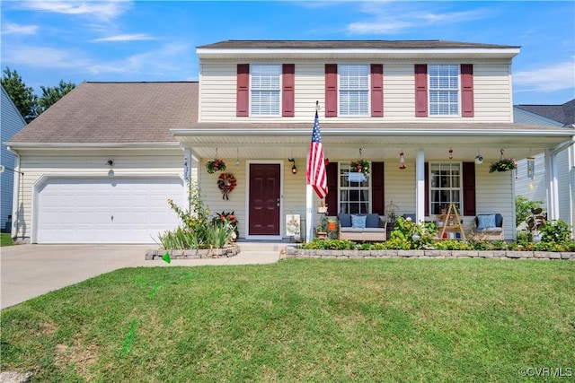 4115 Stonewood Ln, Williamsburg, VA 23188 - view of front of house featuring a porch, a front yard, driveway, and an attached garage