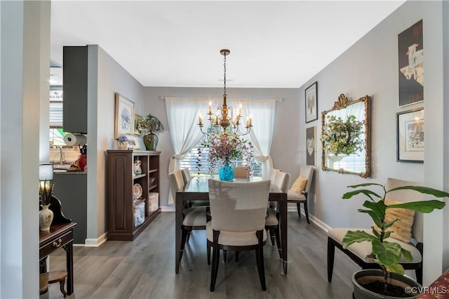 4115 Stonewood Ln, Williamsburg, VA 23188 - dining space featuring a chandelier and wood finished floors