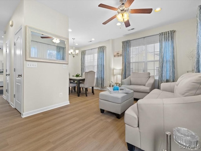 17318 Library Blvd, Ruther Glen, VA 22546 - living area featuring ceiling fan, light wood-style flooring, a chandelier, and recessed lighting