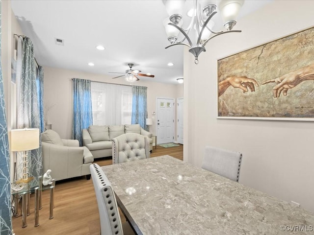 17318 Library Blvd, Ruther Glen, VA 22546 - dining space with light wood-style floors, a chandelier, ceiling fan, and recessed lighting