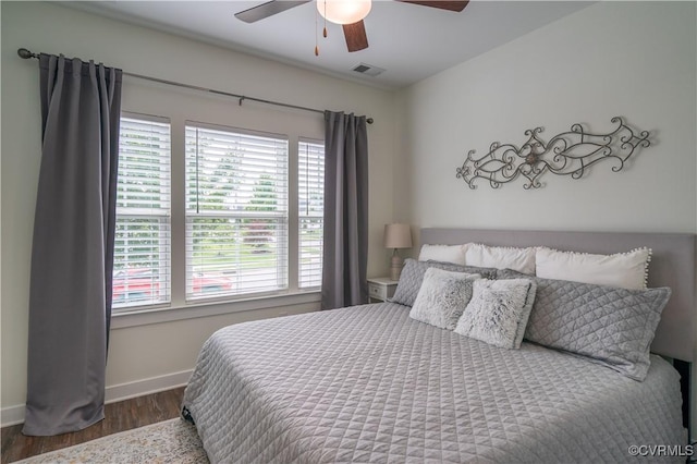 6448 Twin Falls Ter, Moseley, VA 23120 - bedroom with multiple windows, wood finished floors, and a ceiling fan